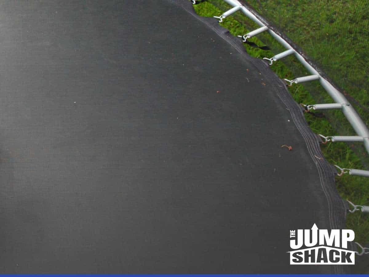 water drainage solutions implemented around an in-ground trampoline to prevent water accumulation